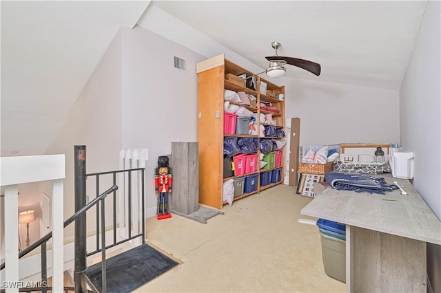 interior space with ceiling fan and visible vents