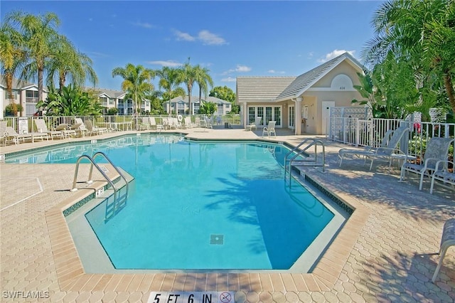 view of swimming pool featuring a patio