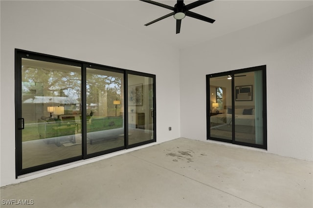 view of patio featuring ceiling fan