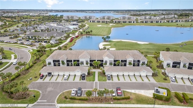 aerial view featuring a water view and a residential view