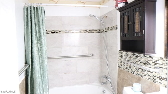 bathroom featuring shower / bath combination with curtain