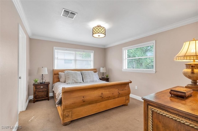 bedroom featuring baseboards, visible vents, ornamental molding, and light colored carpet