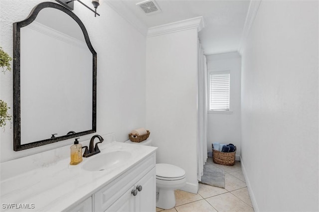 bathroom featuring visible vents, toilet, tile patterned floors, crown molding, and vanity