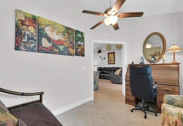 tiled home office with ceiling fan