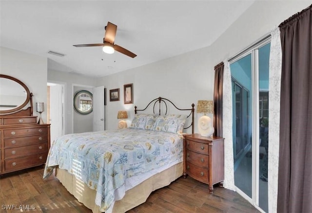 bedroom with dark wood-type flooring and ceiling fan