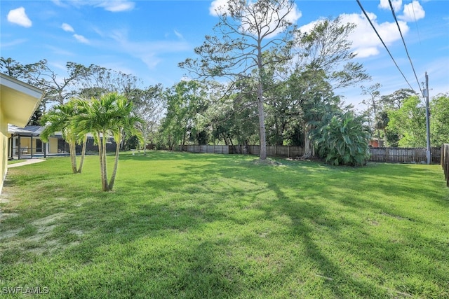view of yard with fence