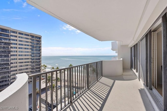 balcony featuring a water view