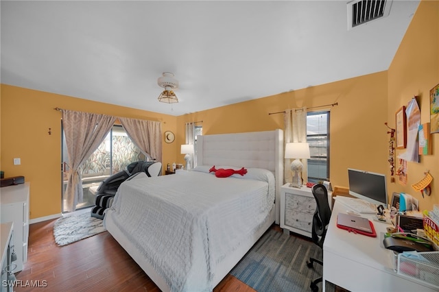 bedroom featuring dark hardwood / wood-style floors