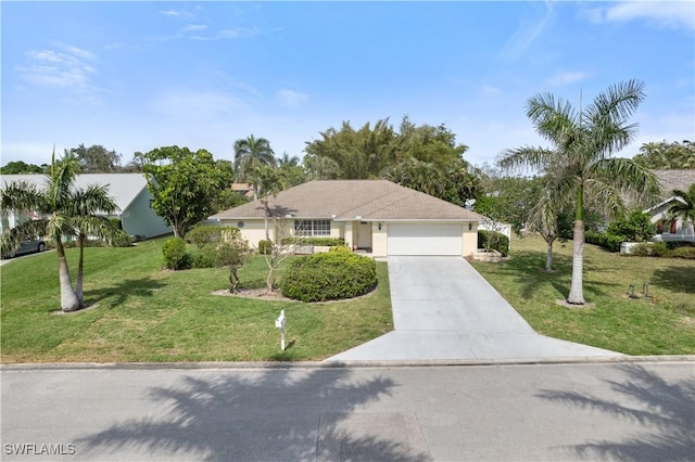 ranch-style house featuring a garage, driveway, and a front lawn