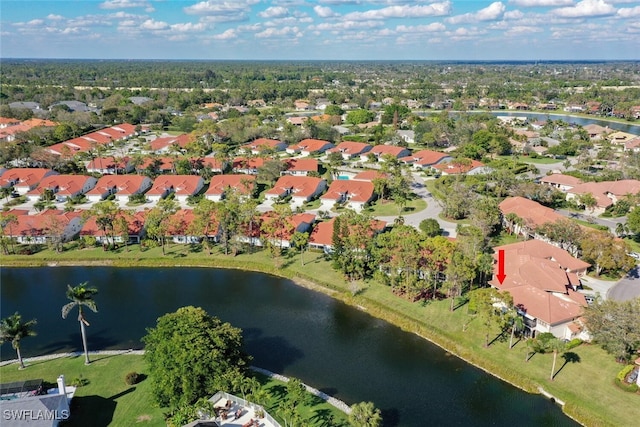 aerial view featuring a water view and a residential view