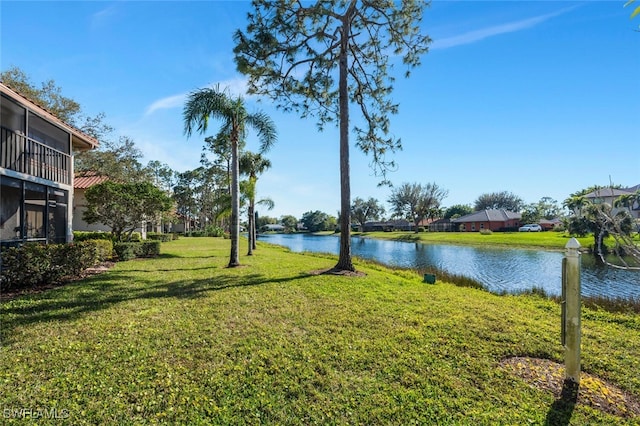 view of yard with a water view