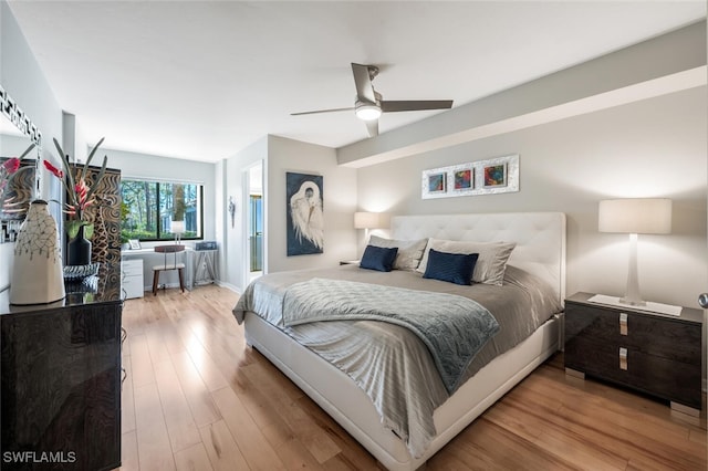 bedroom featuring wood finished floors and a ceiling fan