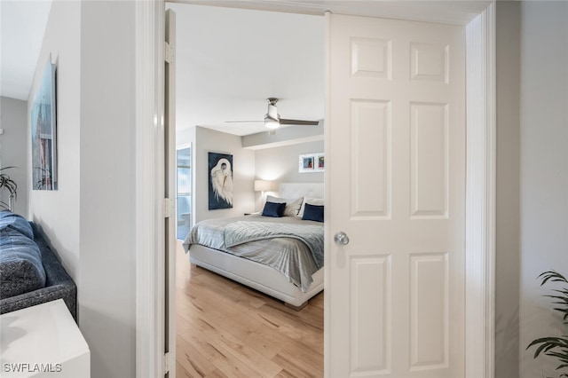 bedroom with ceiling fan and wood finished floors