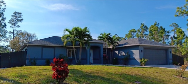 single story home featuring stucco siding, a garage, concrete driveway, and a front lawn