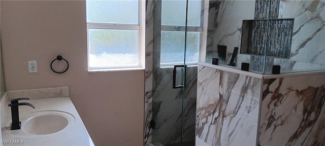 764 Chapman Ave S, Lehigh Acres, FL 33974 - full bathroom featuring a marble finish shower and vanity