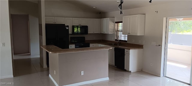 764 Chapman Ave S, Lehigh Acres, FL 33974 - kitchen featuring white cabinets, a wealth of natural light, black appliances, and a sink