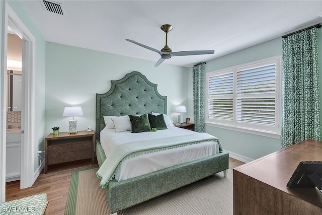 bedroom featuring ceiling fan and light hardwood / wood-style floors