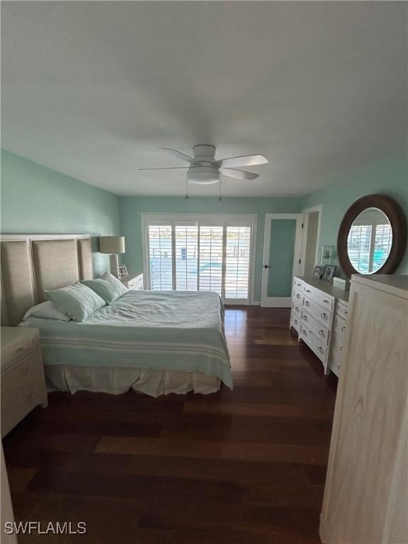 bedroom featuring dark hardwood / wood-style floors and ceiling fan