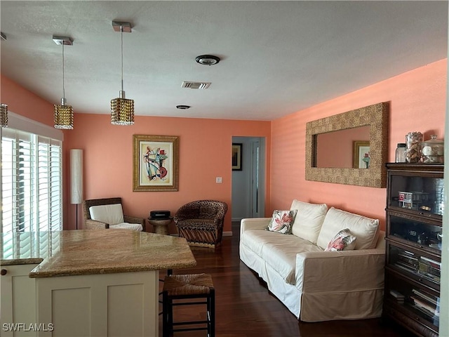 living room featuring dark hardwood / wood-style floors