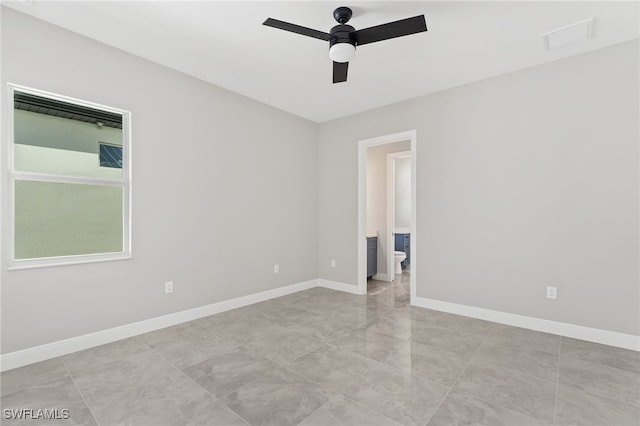 unfurnished room featuring ceiling fan