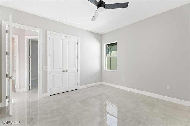 unfurnished bedroom with ceiling fan