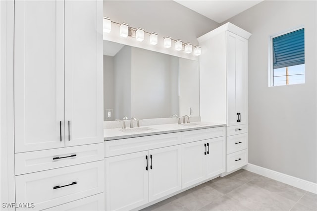 bathroom featuring vanity and tile patterned flooring