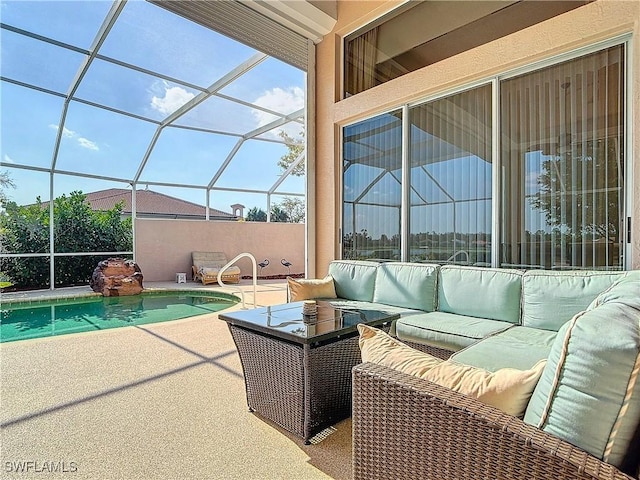 outdoor pool with a lanai, outdoor lounge area, and a patio