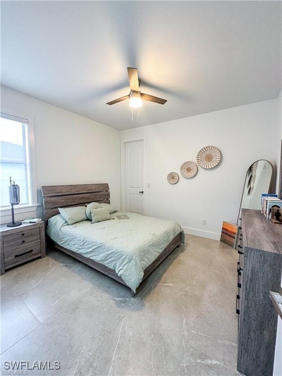 bedroom featuring ceiling fan