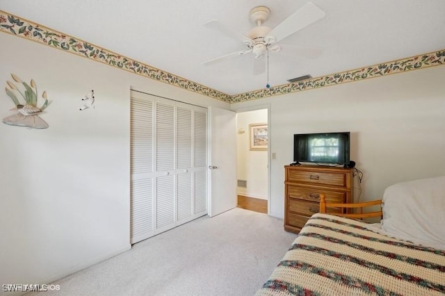 2228 Poinciana Dr, Naples, FL 34105 - bedroom with a closet, carpet flooring, ceiling fan, and visible vents
