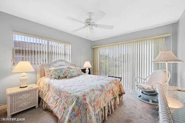 2228 Poinciana Dr, Naples, FL 34105 - bedroom featuring carpet flooring and a ceiling fan