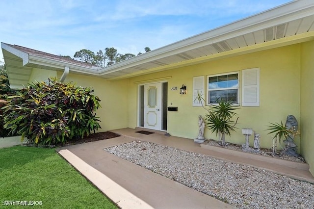 2228 Poinciana Dr, Naples, FL 34105 - entrance to property with stucco siding