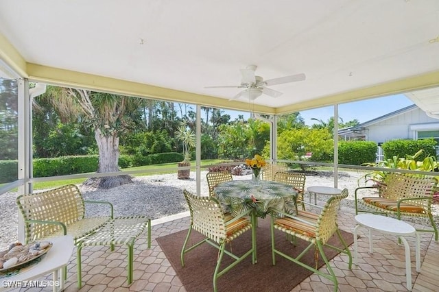 2228 Poinciana Dr, Naples, FL 34105 - view of patio / terrace with outdoor dining space and ceiling fan
