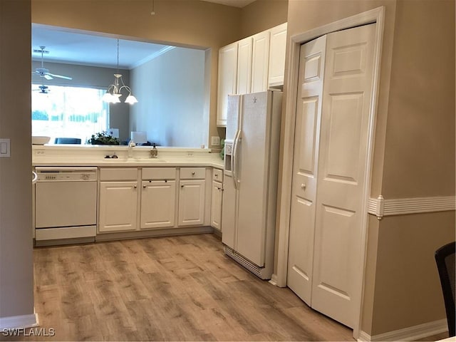 8528 Brittania Dr, Fort Myers, FL 33912 - kitchen featuring white cabinetry, sink, pendant lighting, and white appliances