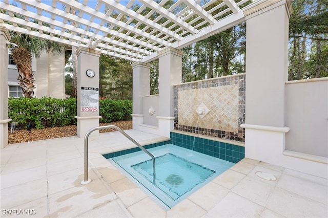 view of swimming pool with a patio, a hot tub, and a pergola