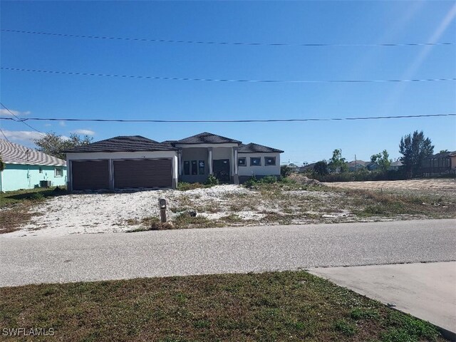 view of front of home featuring a garage