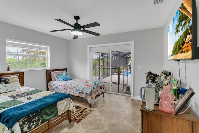 bedroom with a ceiling fan, access to outside, multiple windows, and light tile patterned flooring