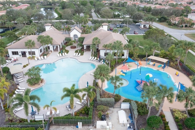 birds eye view of property with a residential view