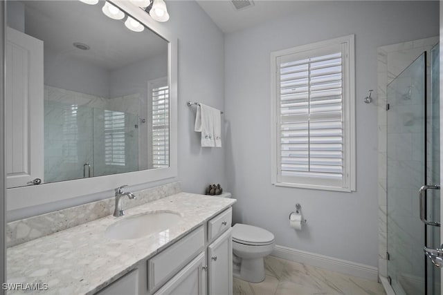 full bath with marble finish floor, a stall shower, vanity, and baseboards