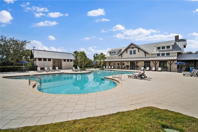 pool with a patio