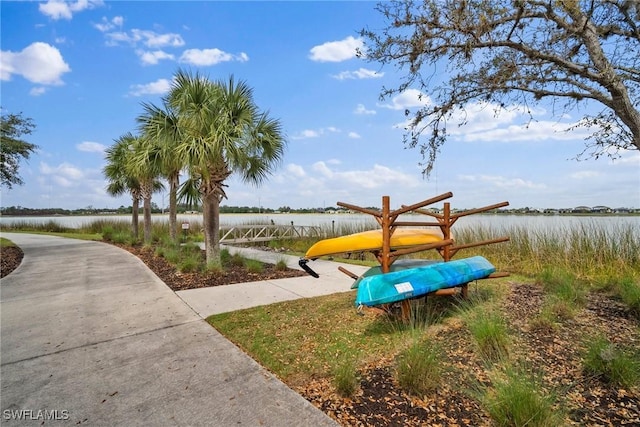 view of home's community with a water view