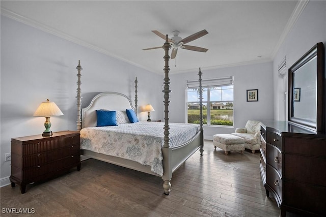 bedroom with dark wood-style floors, ceiling fan, baseboards, and crown molding