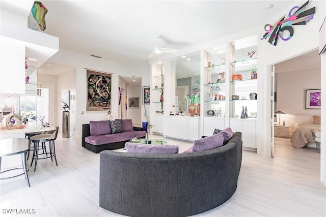 living room with light hardwood / wood-style floors