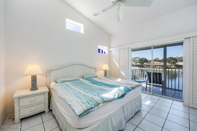 1090 Partridge Cir Unit 201, Naples, FL 34104 - tiled bedroom with ceiling fan, a water view, access to exterior, and lofted ceiling