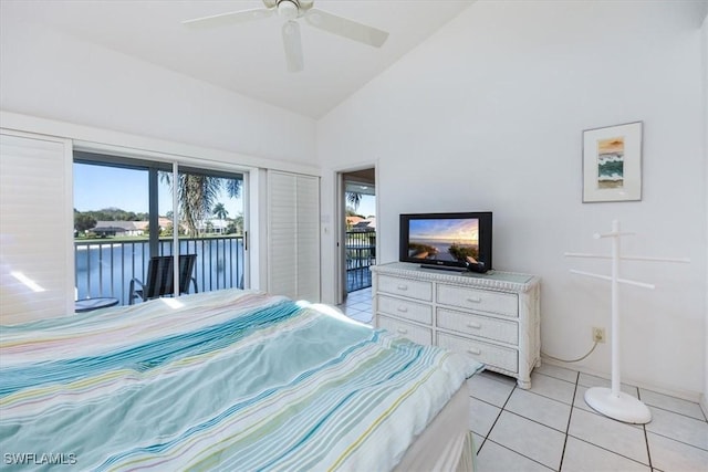 1090 Partridge Cir Unit 201, Naples, FL 34104 - bedroom featuring ceiling fan, light tile patterned floors, access to outside, and lofted ceiling