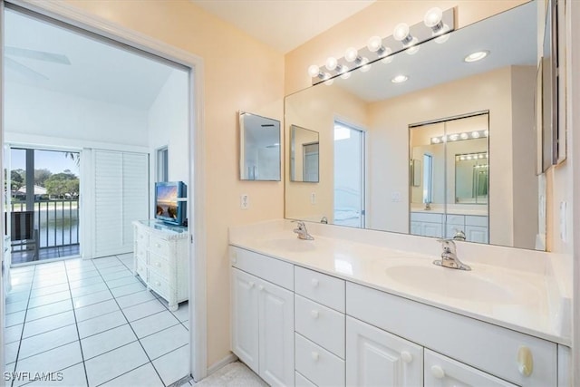 1090 Partridge Cir Unit 201, Naples, FL 34104 - bathroom with vanity and tile patterned floors