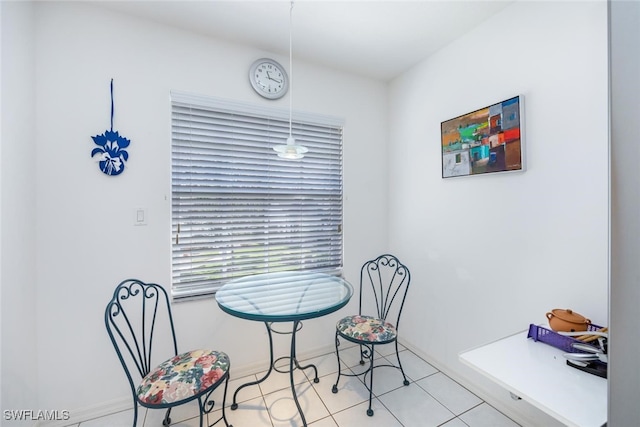 1090 Partridge Cir Unit 201, Naples, FL 34104 - dining room featuring light tile patterned floors