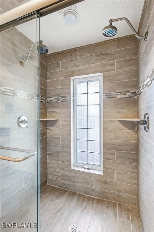 full bath featuring a stall shower