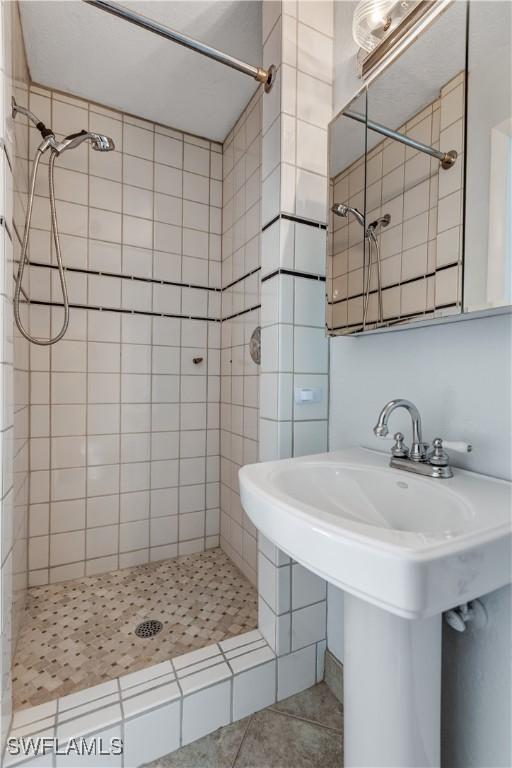 bathroom with a stall shower