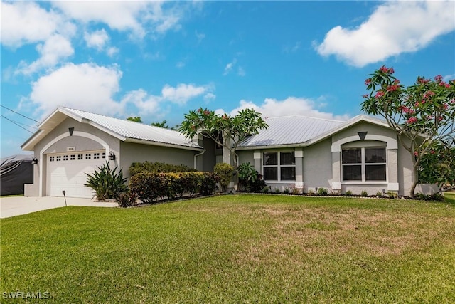 single story home featuring a front yard and a garage