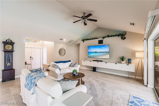 living room featuring vaulted ceiling, light colored carpet, and ceiling fan